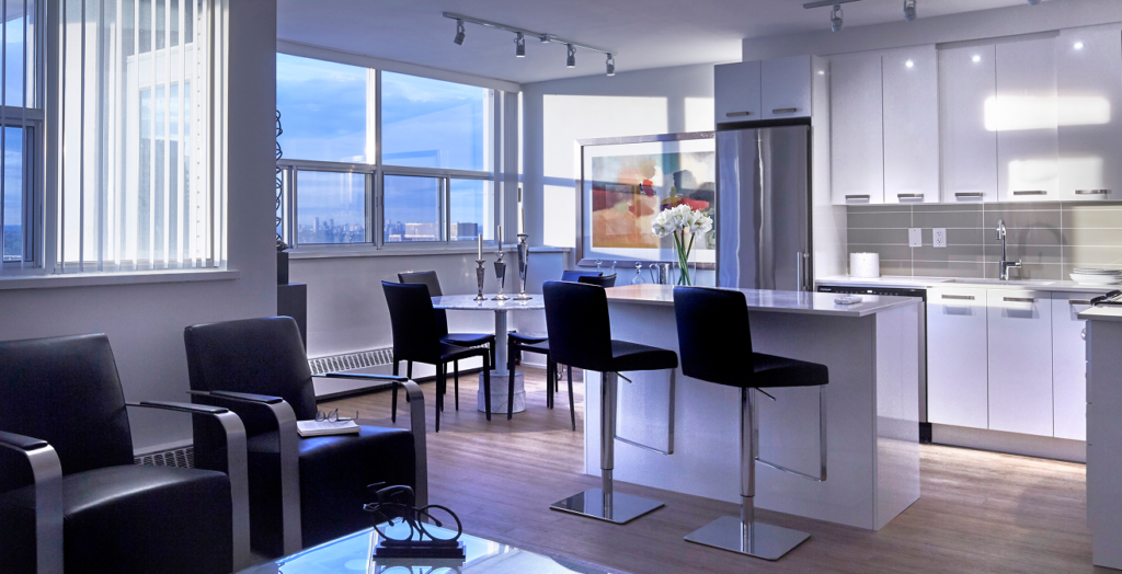 Bright dining and kitchen area in a renovated 18 Brownlow suite, showcasing the generous square footage and high-end modern finishes.